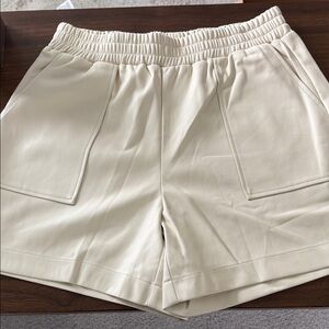 Dolce Cabo High Waist Cream Shorts